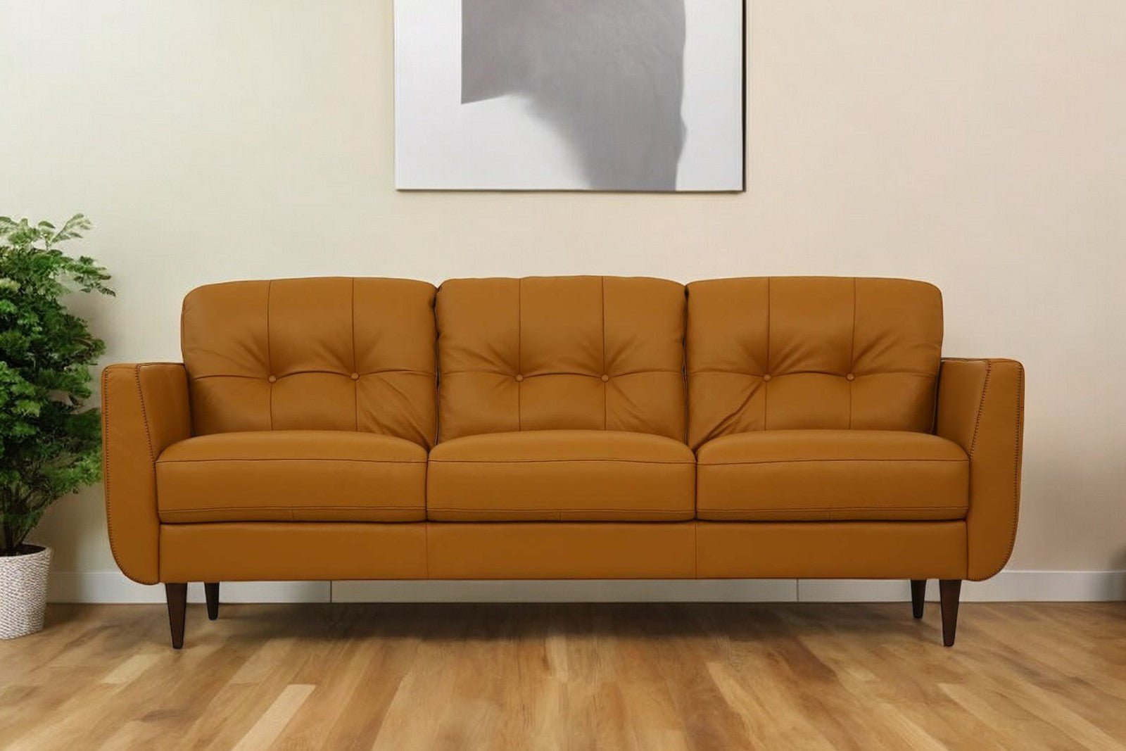 the-longhorn-orange-leather-sofa-with-black-legs-4273151 The Longhorn – Orange Leather Sofa with Black Legs - Image 1